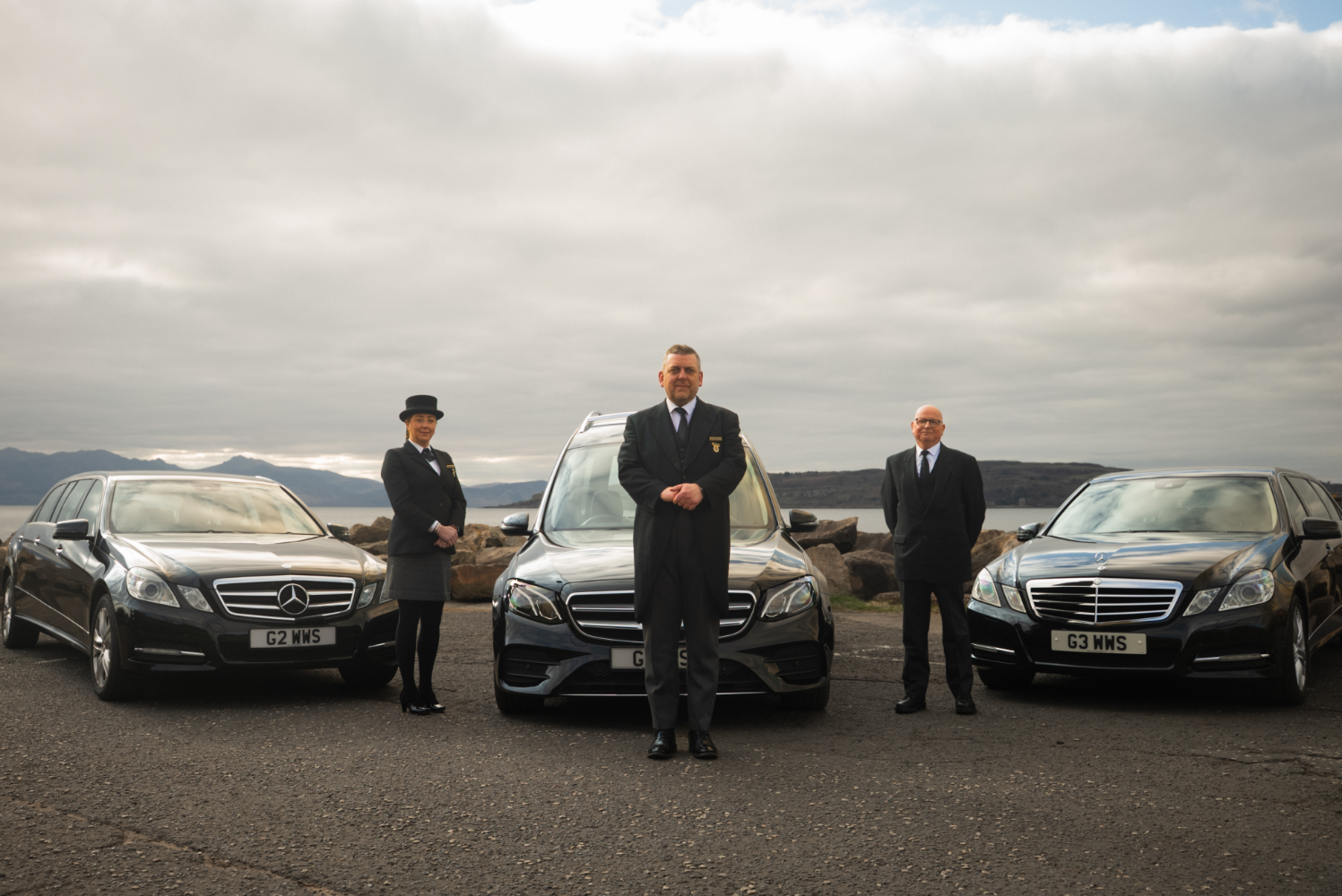 Image of the stsff and vehicle fleet of William Wallace and Son